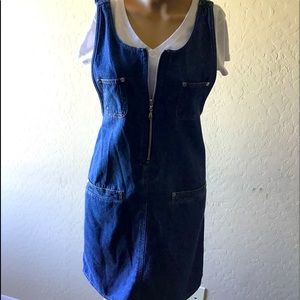 This is a vintage denim jumper. Zips up the front.